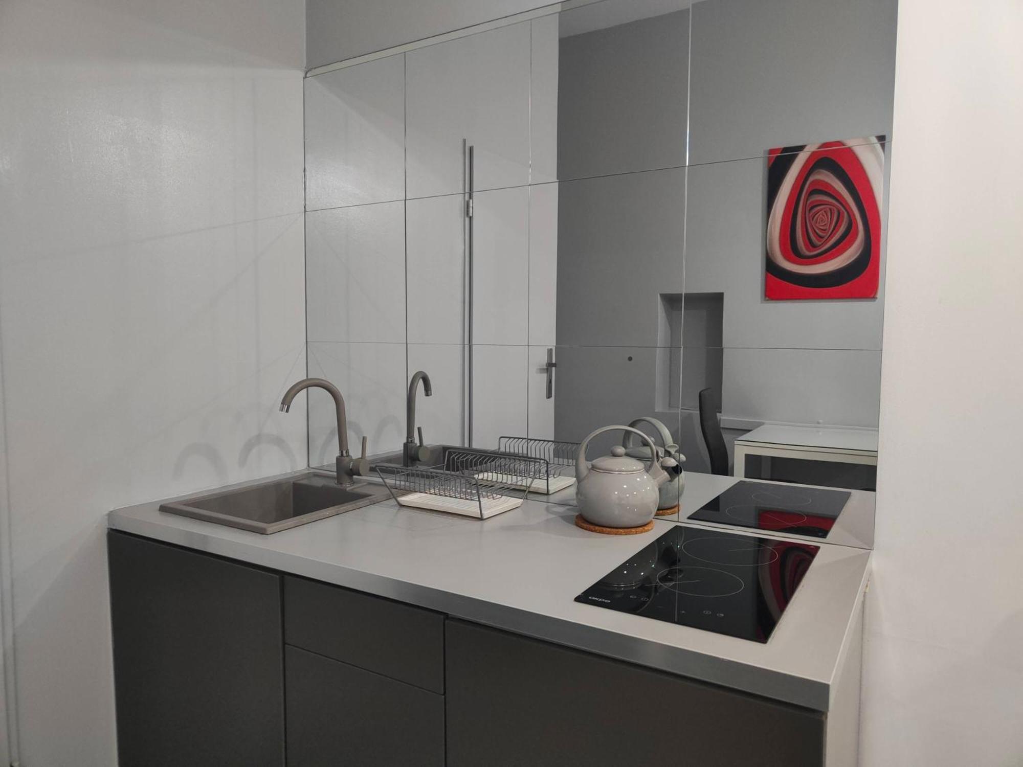 Appartement Mirror Gold & Grey